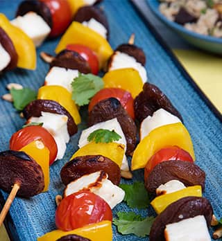 A photo of Halloumi, Apricot Kebabs with Summer Couscous